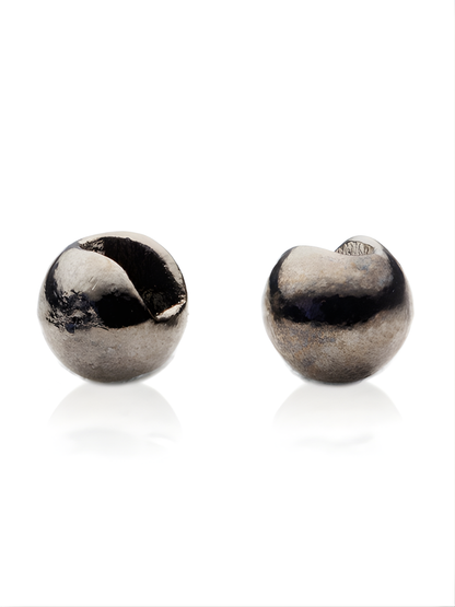 Two fishing black nickel slotted beads on a white background