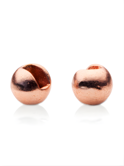 Two fishing slotted copper beads on a white background